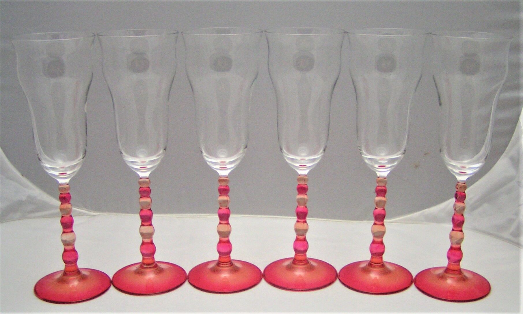 6 colored glass champagne flutes