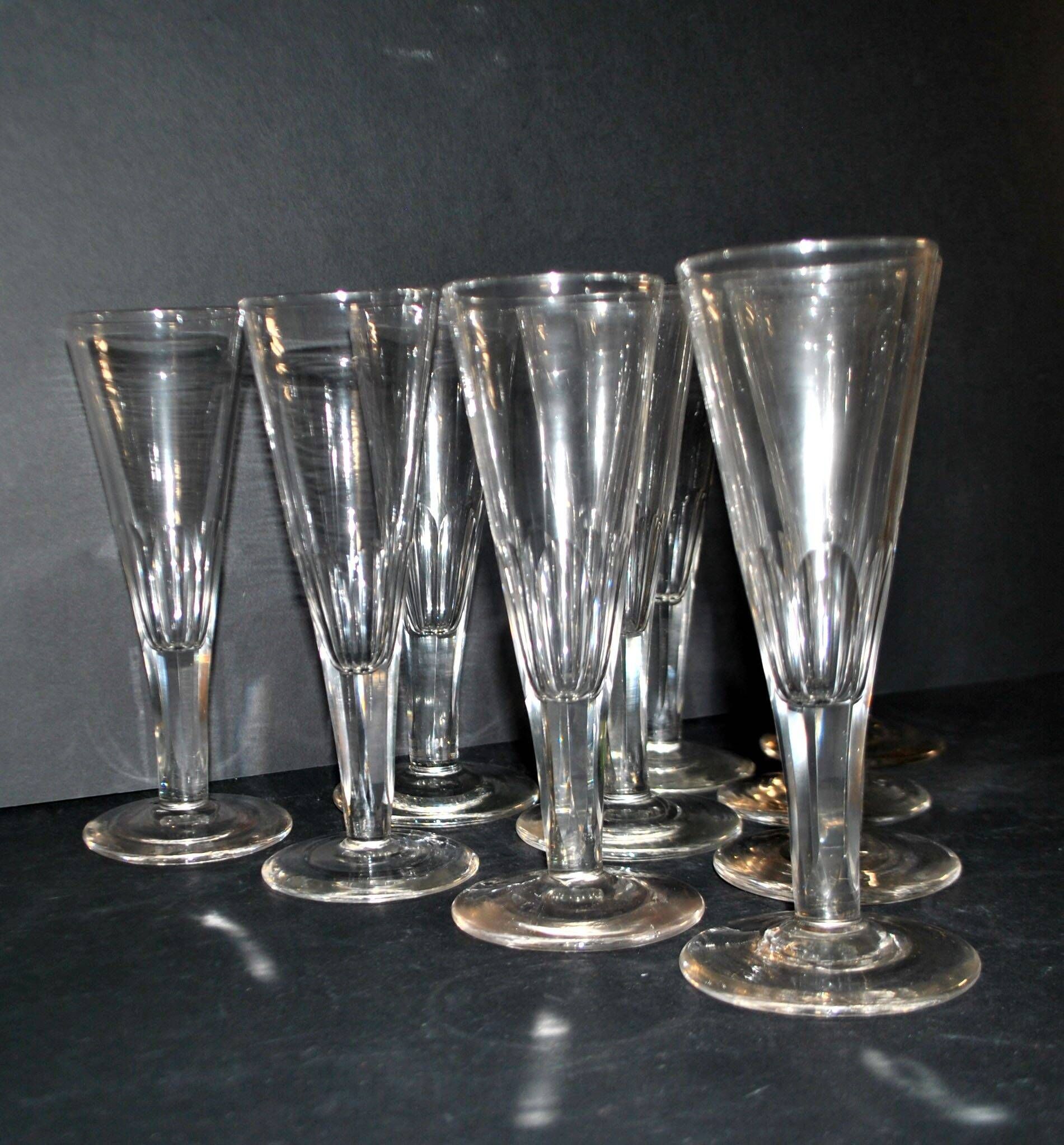 Portieux? Meisenthal? Set of 10 cut glass champagne flutes with flat sides from 1900.