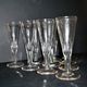 Portieux? Meisenthal? Set of 10 cut glass champagne flutes with flat sides from 1900.