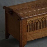 Modern Danish oak commode with decorative relief sculpture, mid-20th century.