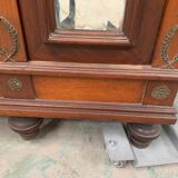 Empitre style three-door wardrobe in mahogany and 20th century veneer