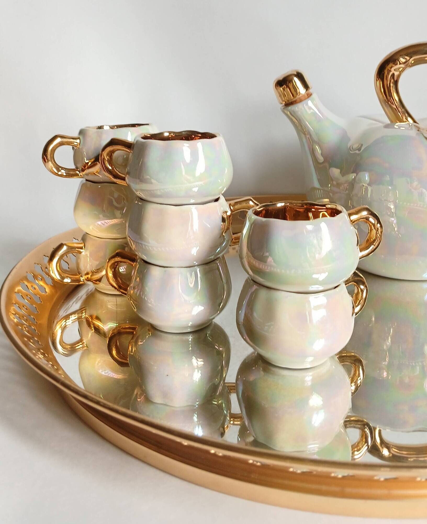 Fruit-shaped liqueur service in porcelain or tea set with its mirror tray.