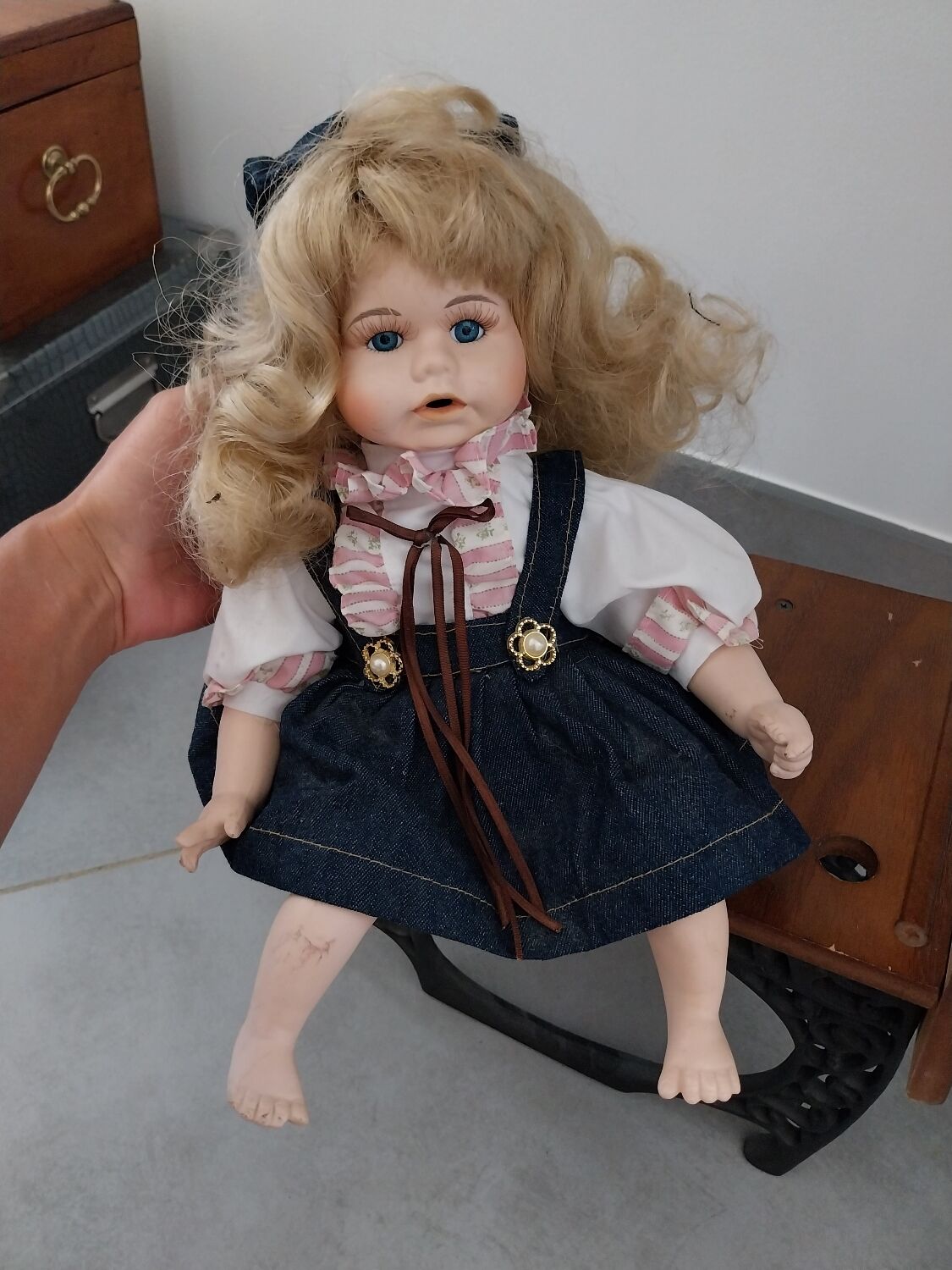 Wooden swing desk and porcelain dolls