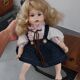 Wooden swing desk and porcelain dolls