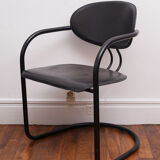 Fauteuil noir pieds en arc