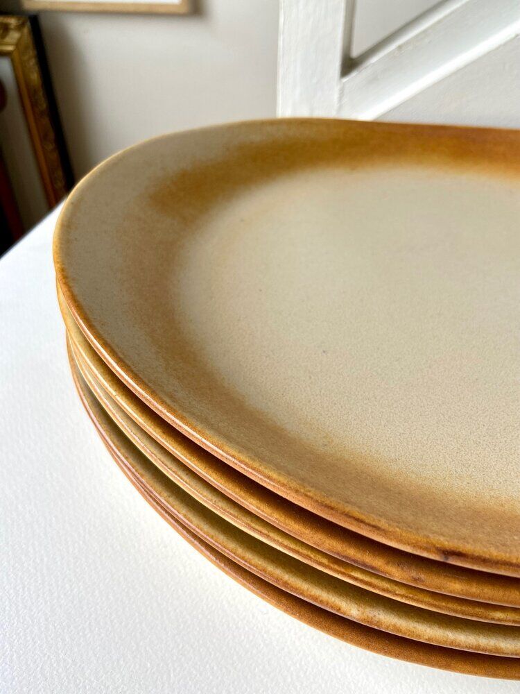 Set of 5 enamelled sandstone plates