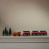 Wooden train with soldiers