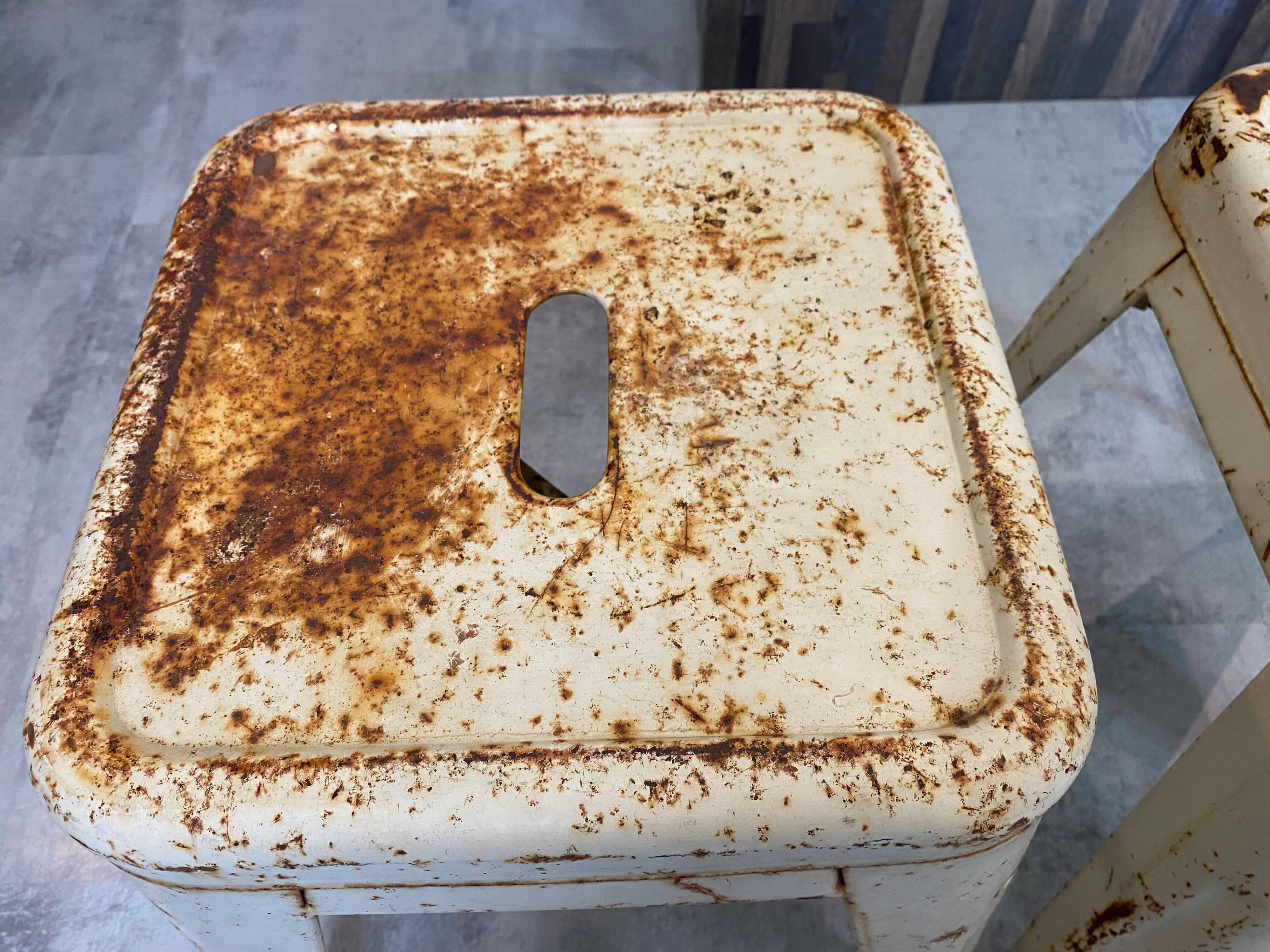 Authentic pair of Xavier Pauchard industrial Tolix metal stools 50