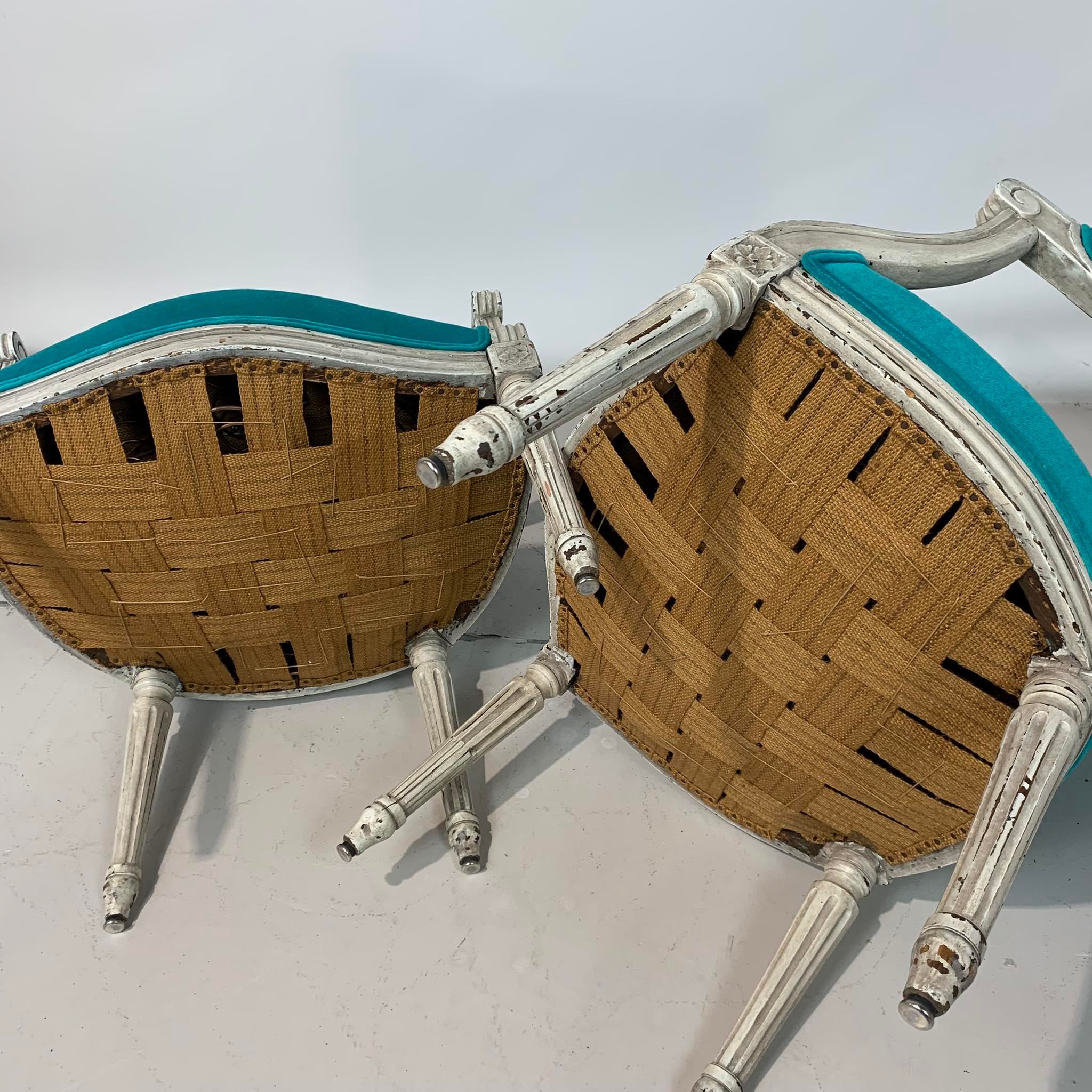 Pair of Louis XVI convertible armchairs