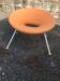 Ploof orange plastic chair by Philippe Starck for Kartell, polished aluminium legs.