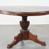 Wooden round 4-person dining table with detailed leg