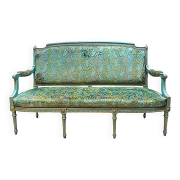 Louis XVI style bench in blue lacquered wood with gold highlights.