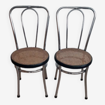 Pair of chrome and cane bistro chairs from the 70s.