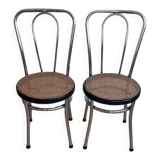 Pair of chrome and cane bistro chairs from the 70s.