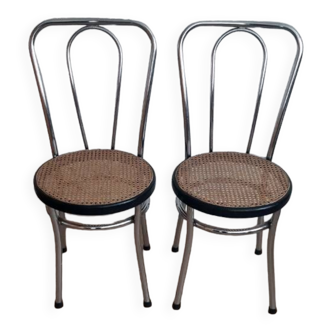 Paire de chaises bistrot chrome et cannage des années 70.