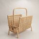 Vintage magazine rack in woven rattan and bamboo.