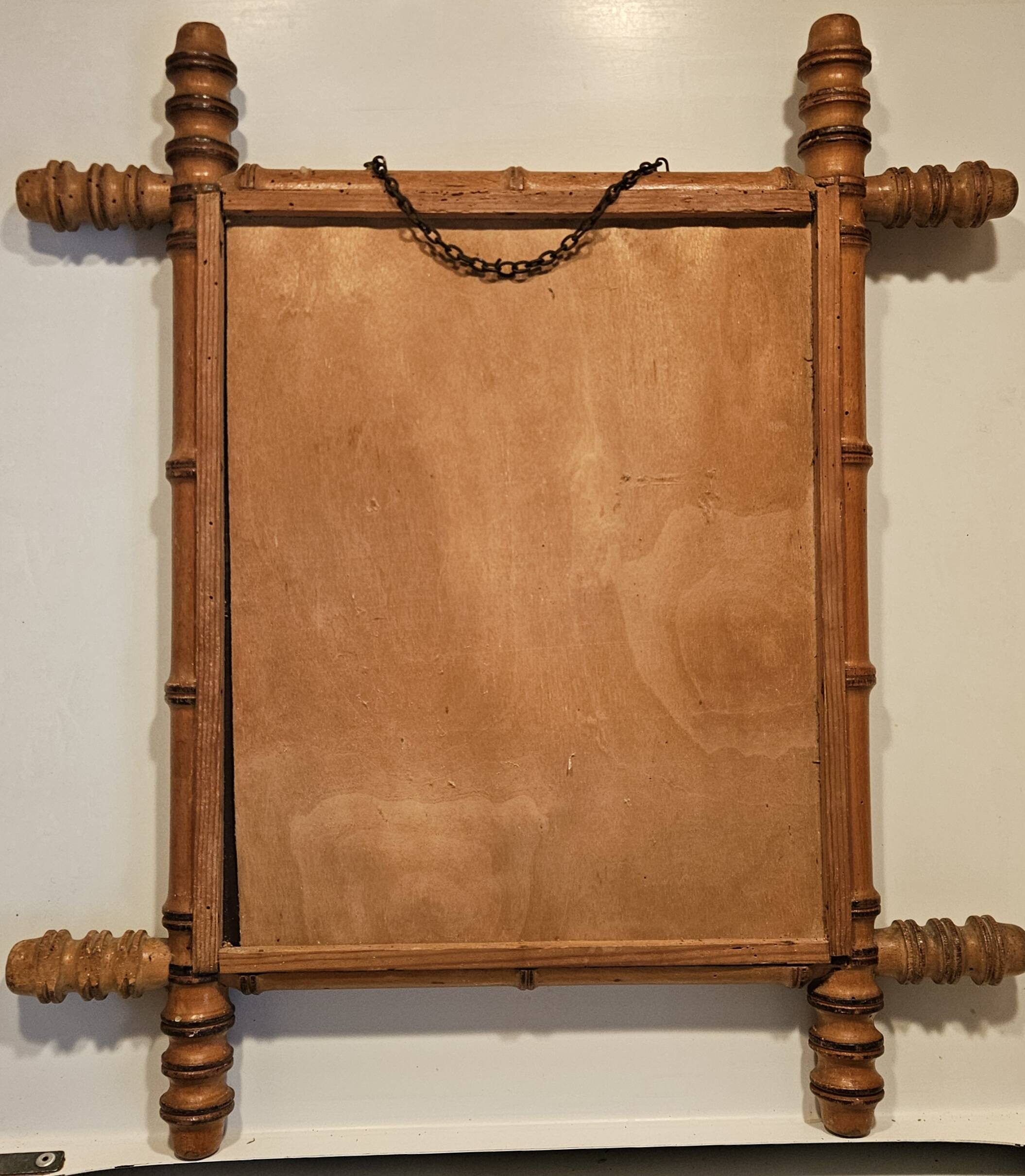 Turned wooden mirror in bamboo style from the 1930s.