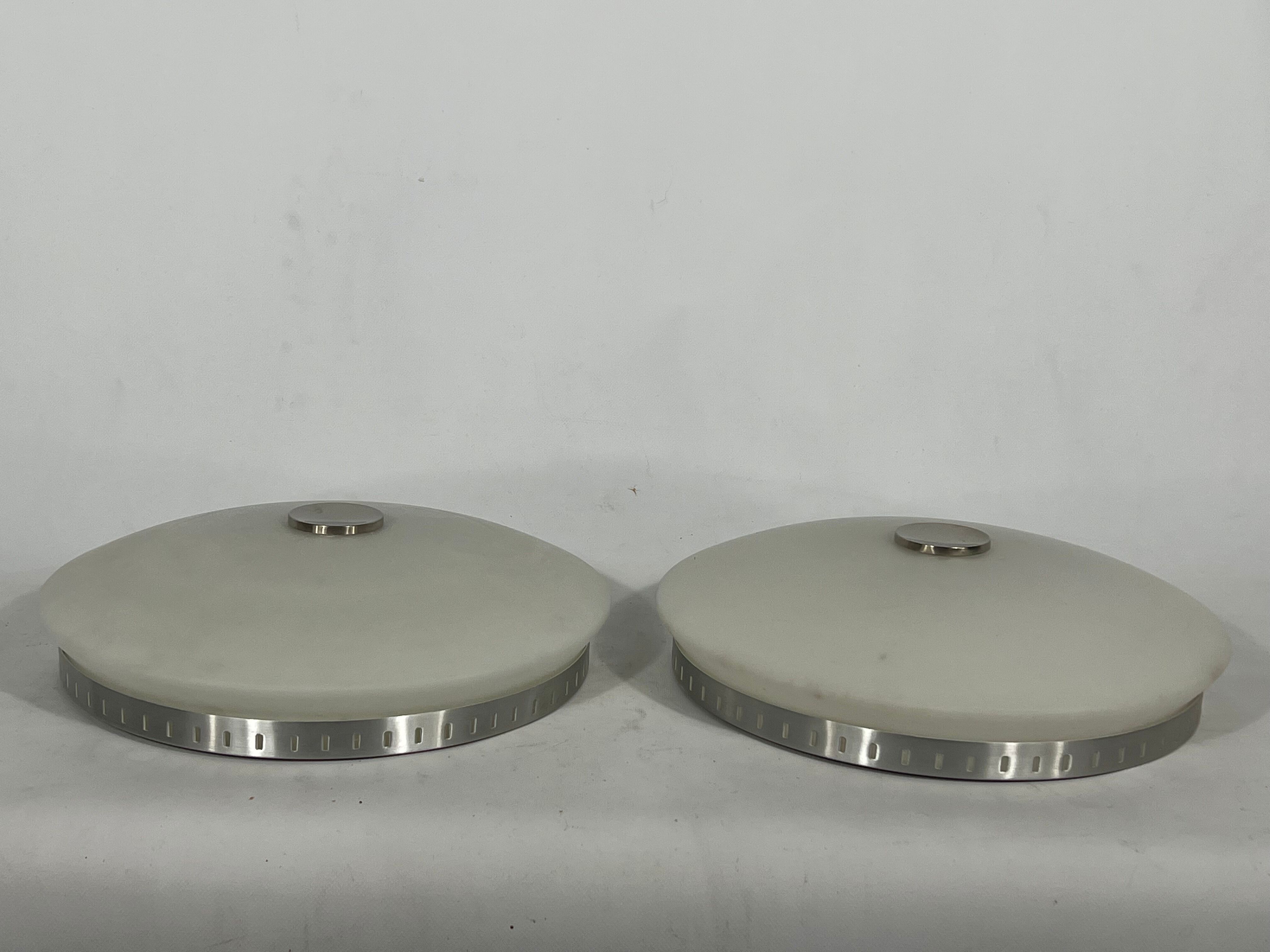 Stilux Milano, pair of round opaline glass ceiling lamps. 1960s