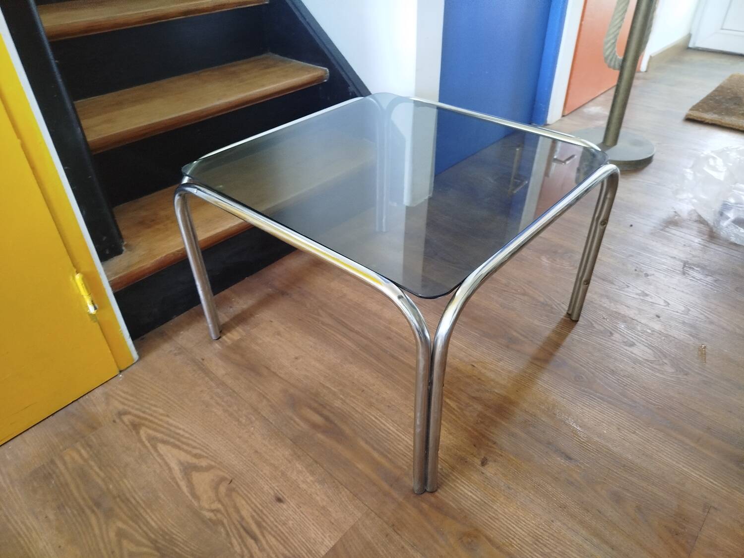 Italian design coffee table with chrome metal and smoked glass from the 1970s.