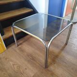 Italian design coffee table with chrome metal and smoked glass from the 1970s.