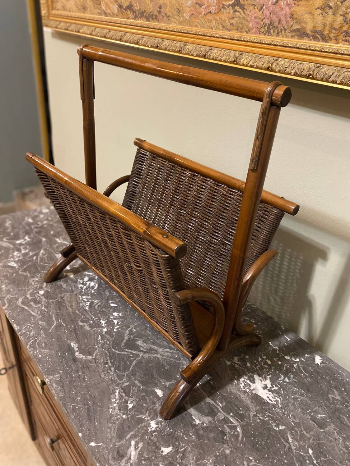 Wicker and brown wood magazine rack