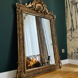 Miroir doré en bois