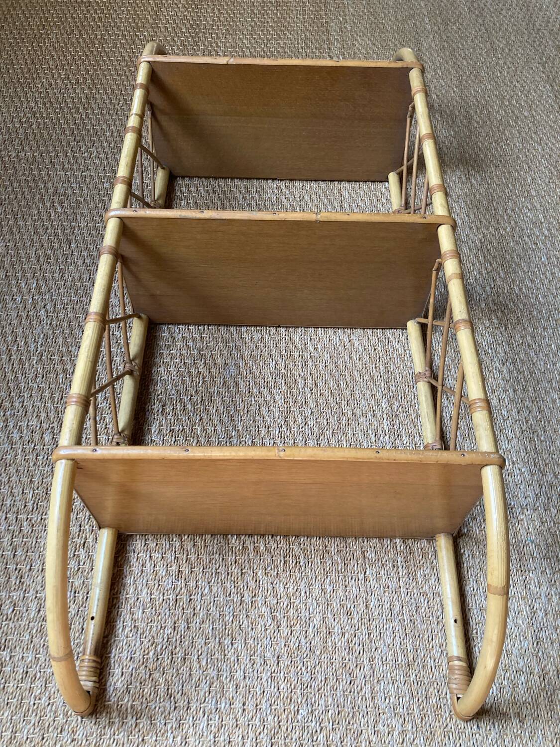 Vintage vertical wall mounted rattan shelf