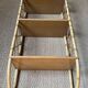 Vintage vertical wall mounted rattan shelf