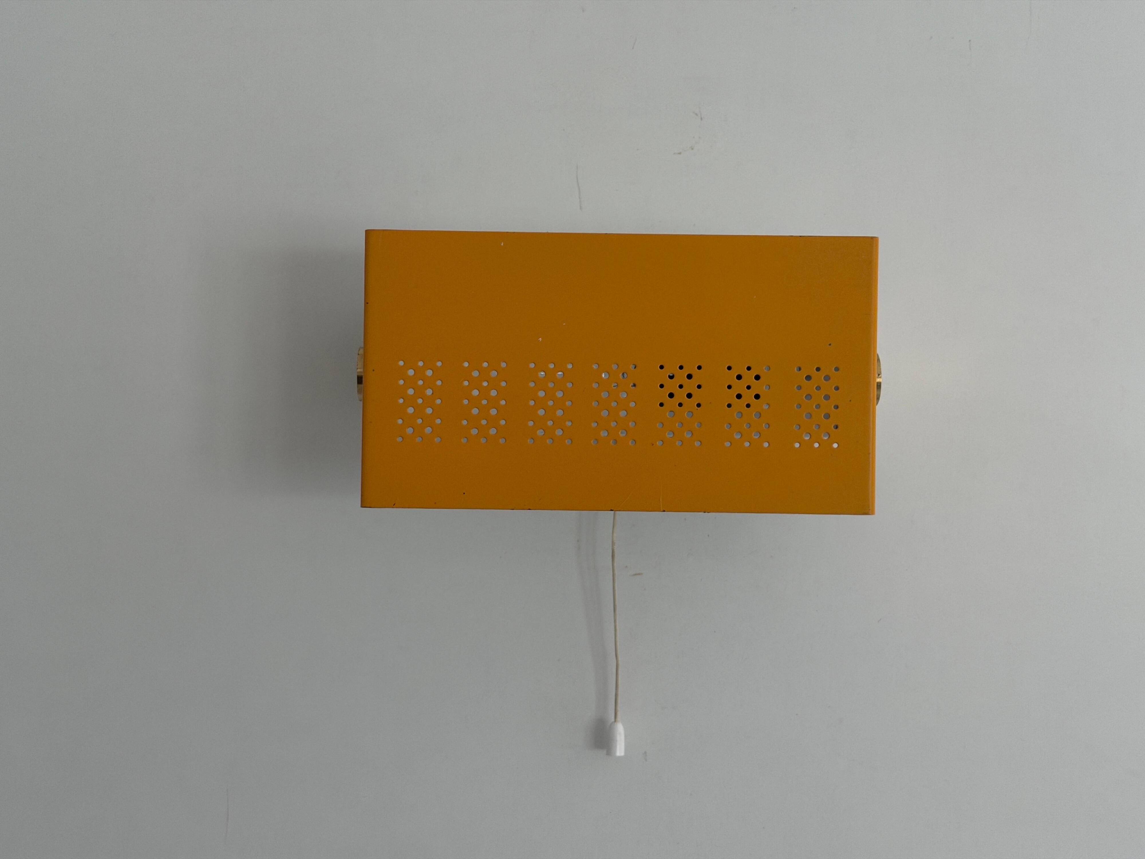 Pair of yellow metal wall lights from the mid-century by N Leuchten, 1960s, Germany.