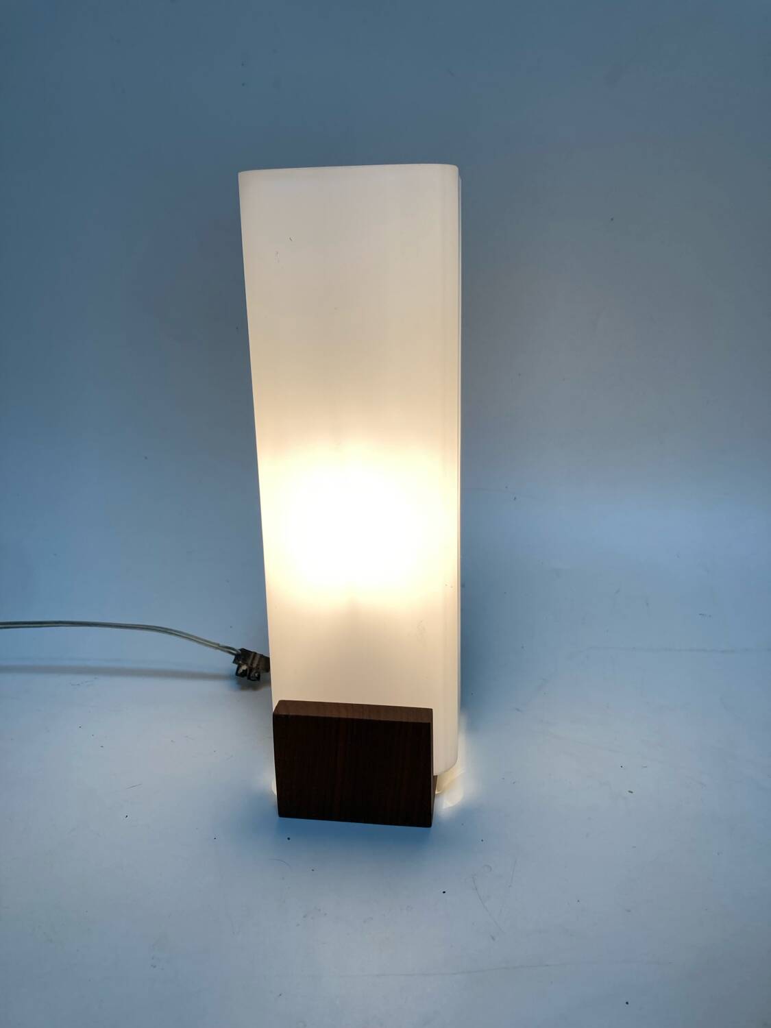 Many Louis Kallf wall lights.