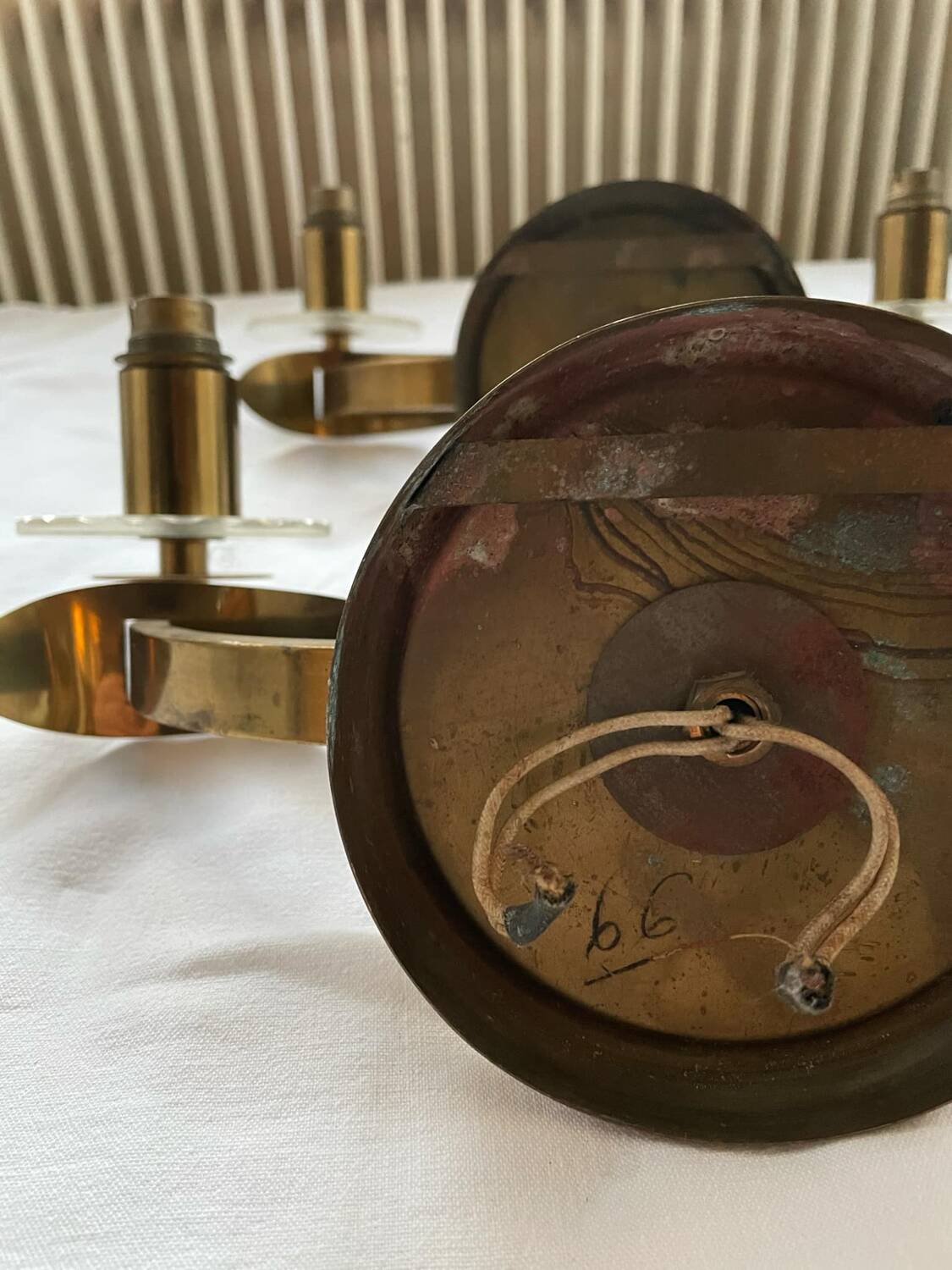 Vintage pair of art deco brass and mirrored glass wall lights France 1940