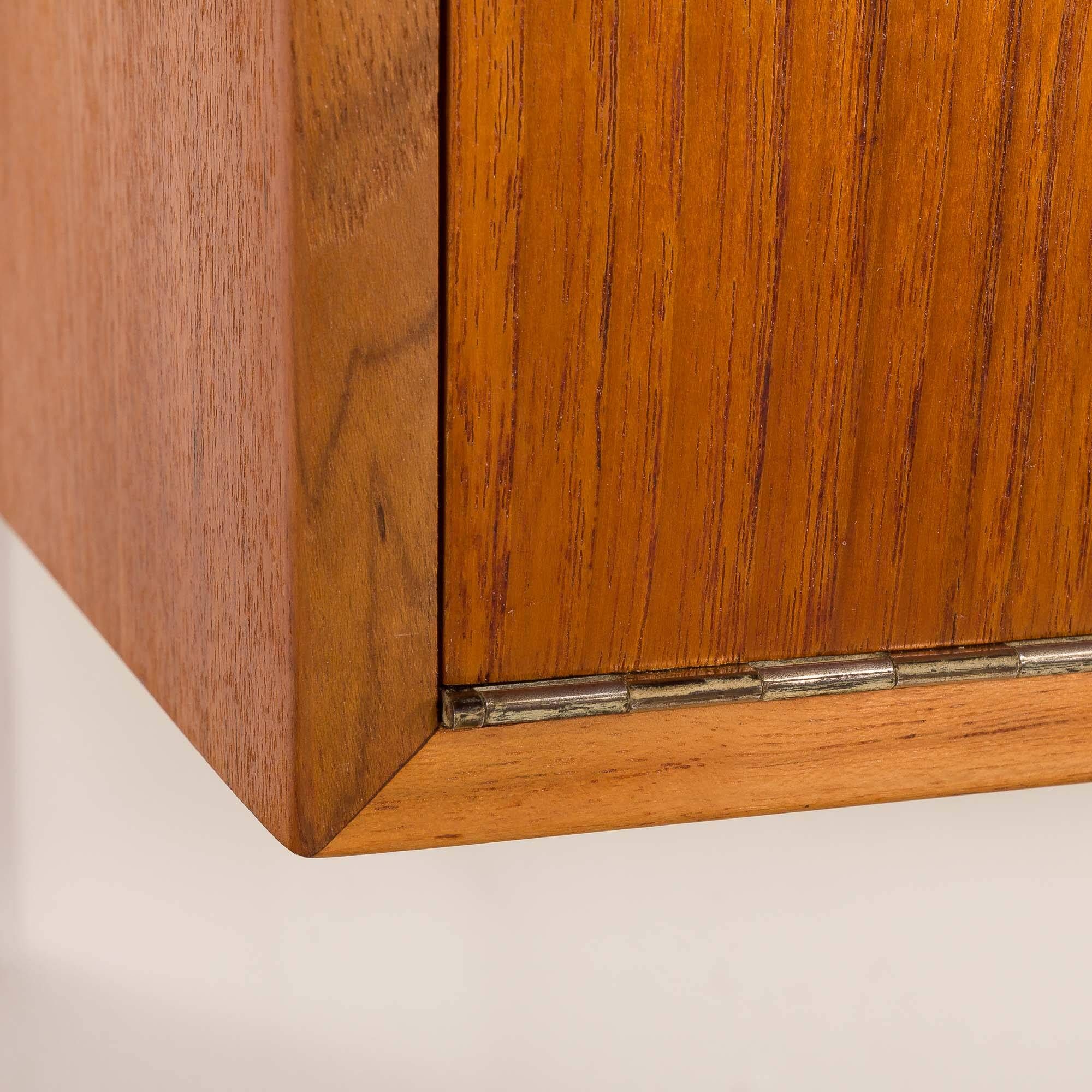 Hansen and Guldborg teak wall unit with a bar cabinet, Denmark 1950s