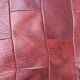 Pair of vintage poufs in burgundy leather patchwork, 1970