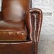 Studded club armchair