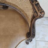 Fauteuil de bureau louis xv, sculpté, canné, garni cuir