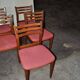 Set of 5 brown wooden chairs from the 70s, with red fabric seats - 2 with armrests.