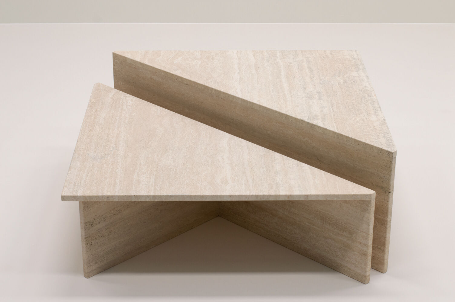 Up&Up triangle travertine coffee table, Italy 70s