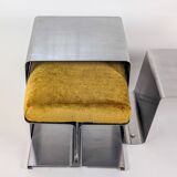 Stainless steel coffee table and stool, by the Roche Bobois design office, 1970