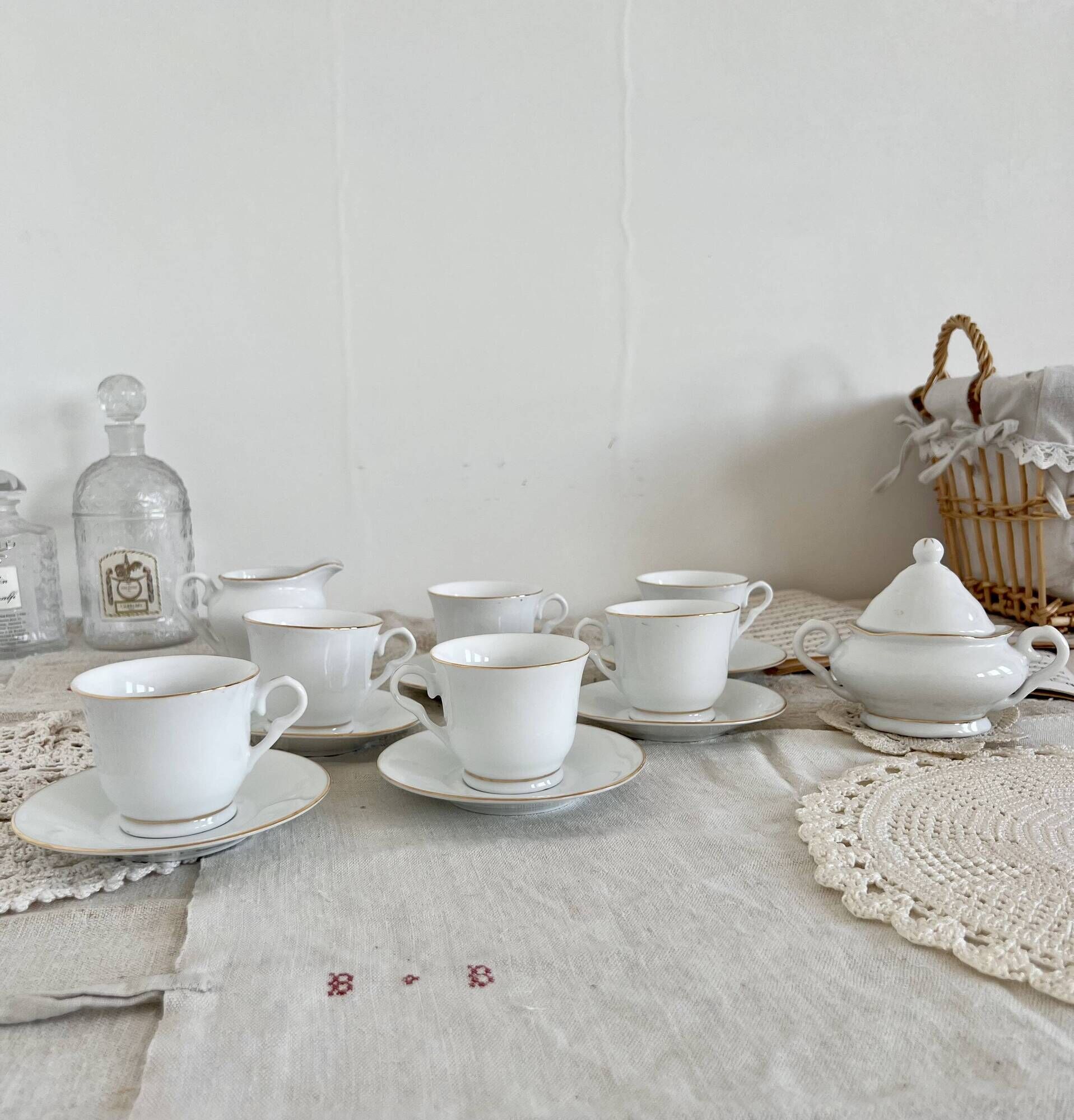 Vintage porcelain tea/coffee service with gold edging for 6 people, sugar bowl and milk jug