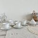 Vintage porcelain tea/coffee service with gold edging for 6 people, sugar bowl and milk jug