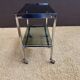 Metal and smoked glass dessert table