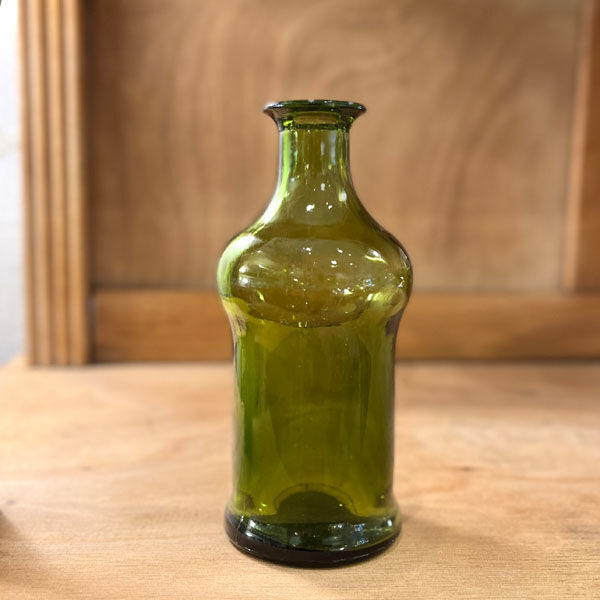 Green glass bottle or vial