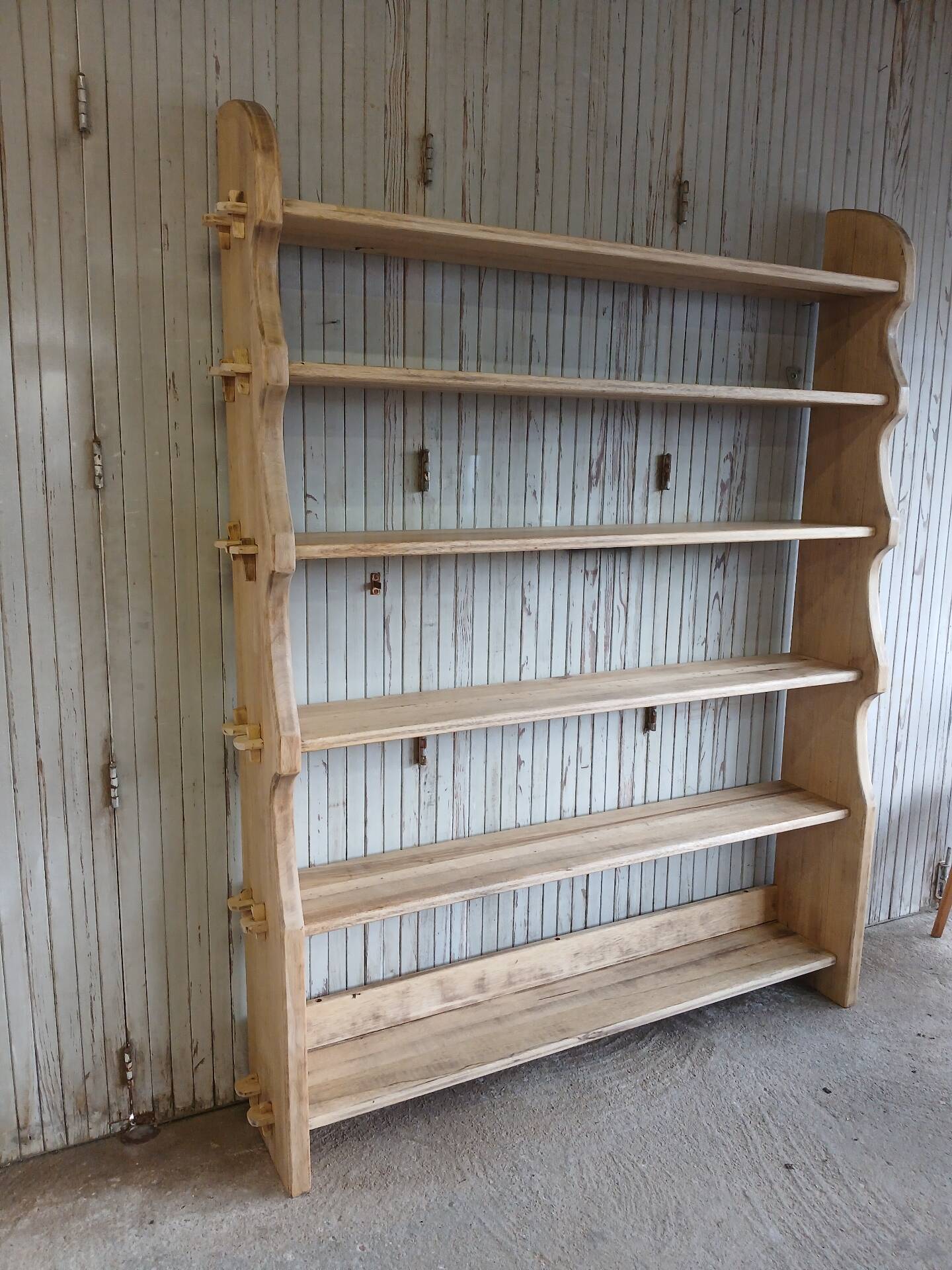Solid wood shelf in brutalist style