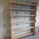 Solid wood shelf in brutalist style