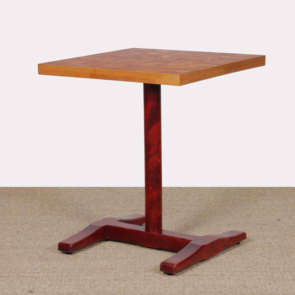 Square wooden dining table with a pedestal from the 1980s.