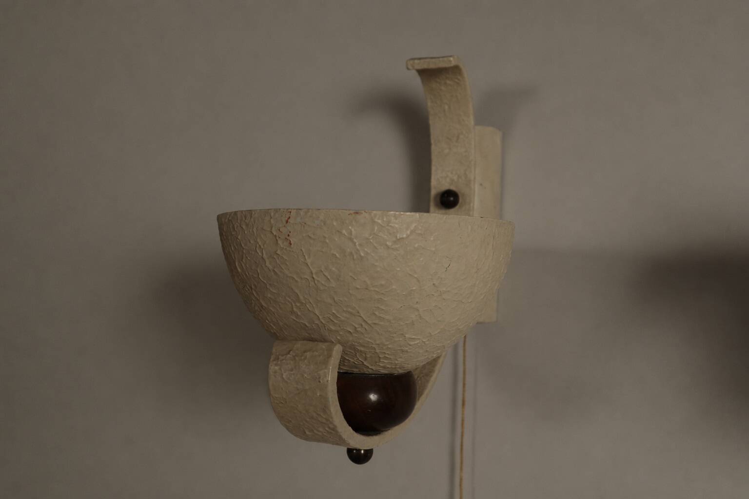 Pair of sculptural mid-century wall uplighters, circa 1950