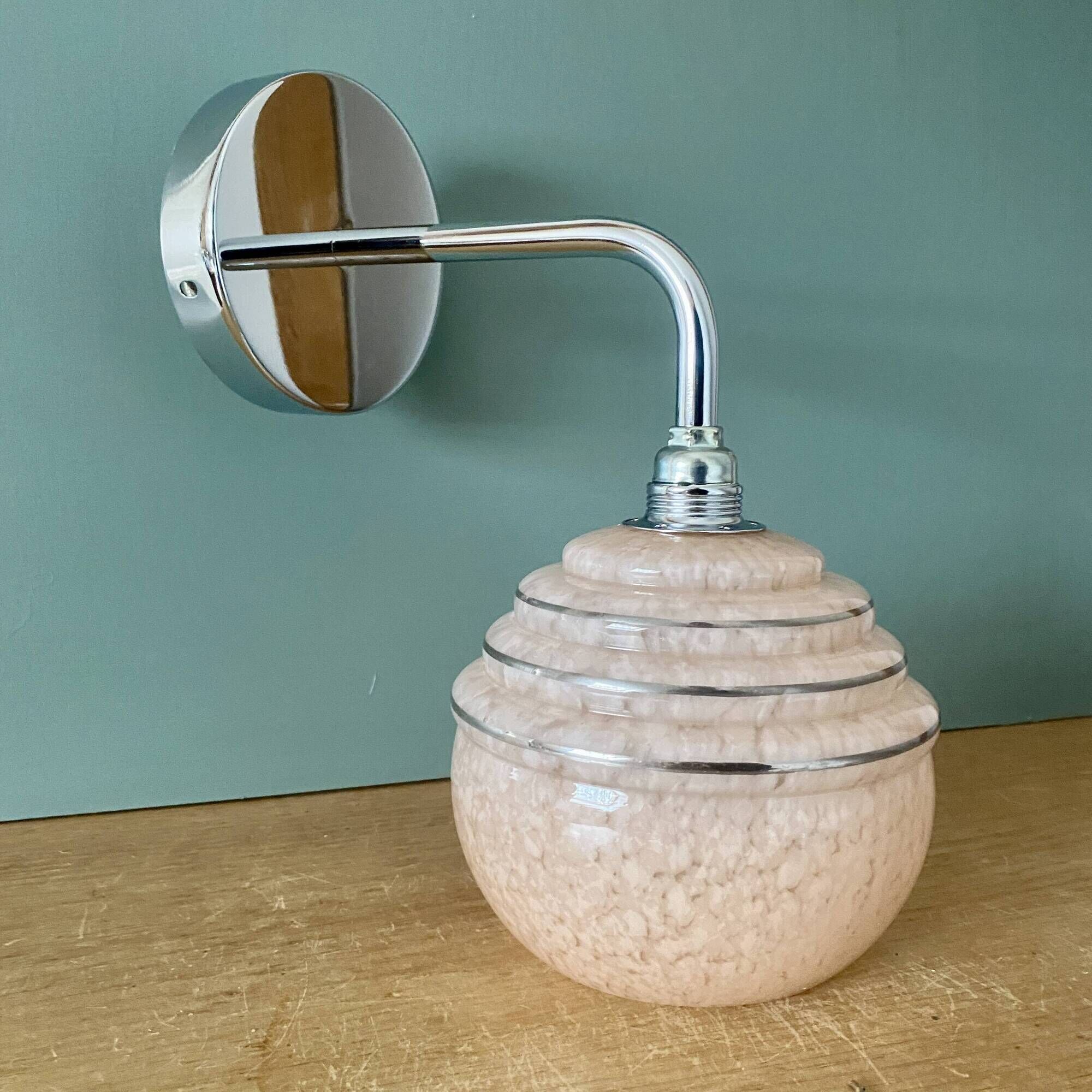 Vintage golden globe elbow wall light in pink and silver Clichy glass