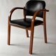 Chaise de bureau bois et Skaï noir 1980