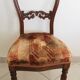 Carved wooden chair and velvet