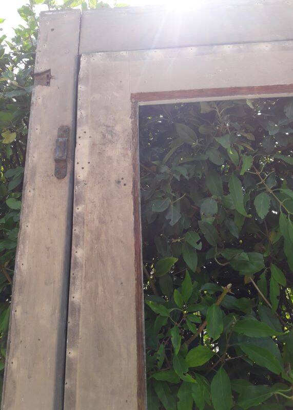 Old glazed door 211.5x105.5cm and its entrance door frame.